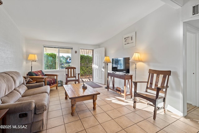 925 W 4th Ave, San Manuel, AZ 85631 - living area featuring light tile patterned flooring and vaulted ceiling