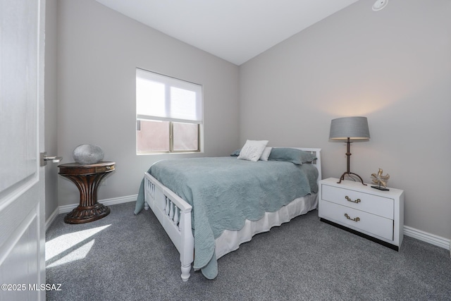 bedroom featuring carpet flooring and baseboards