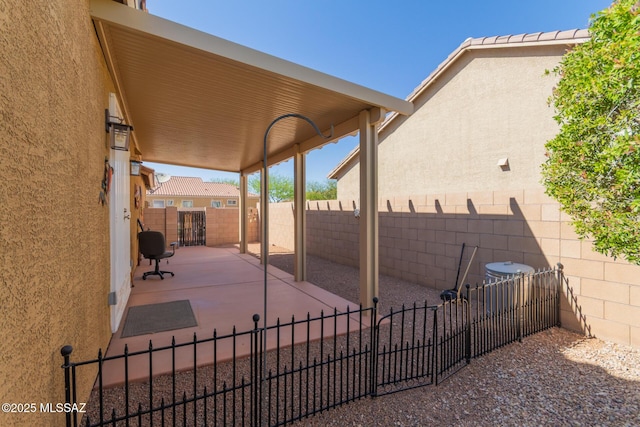 view of patio featuring a fenced backyard