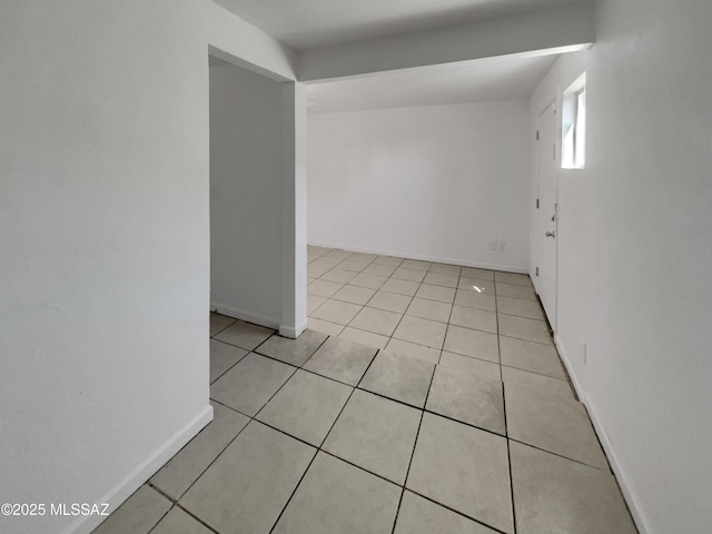 6760 S Calle Gavilan, Tucson, AZ 85746 - unfurnished room featuring baseboards and light tile patterned flooring