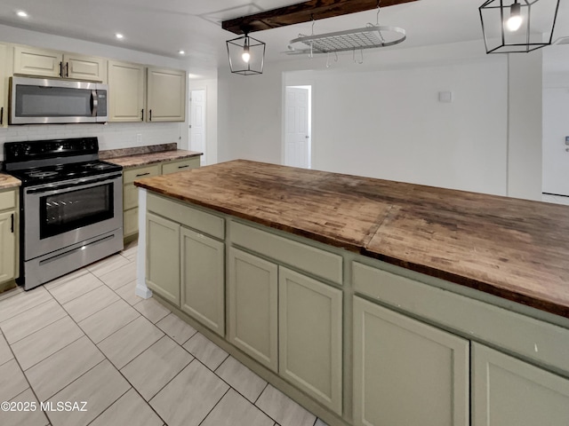 6760 S Calle Gavilan, Tucson, AZ 85746 - kitchen with recessed lighting, light tile patterned floors, butcher block counters, hanging light fixtures, and appliances with stainless steel finishes