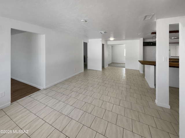 6760 S Calle Gavilan, Tucson, AZ 85746 - interior space with visible vents and baseboards