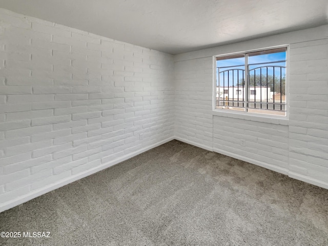 6760 S Calle Gavilan, Tucson, AZ 85746 - unfurnished room with dark colored carpet and baseboards