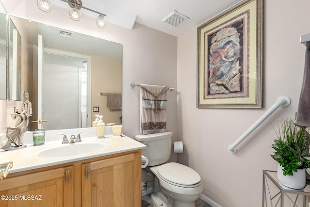 3825 W Perseus St, Tucson, AZ 85742 - bathroom with visible vents, toilet, and vanity