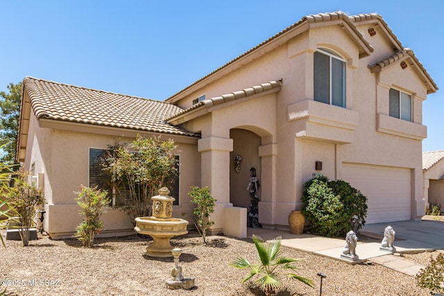 3825 W Perseus St, Tucson, AZ 85742 - mediterranean / spanish-style home with a garage, a tile roof, concrete driveway, and stucco siding
