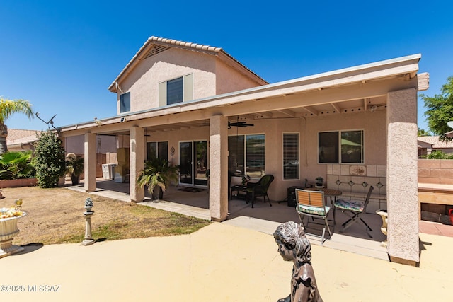 3825 W Perseus St, Tucson, AZ 85742 - back of property featuring stucco siding, a patio, and ceiling fan