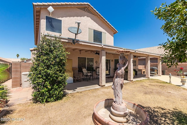 3825 W Perseus St, Tucson, AZ 85742 - rear view of property featuring stucco siding, fence, a patio, and ceiling fan