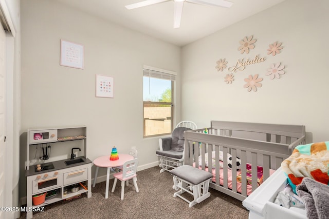 17949 S Whispering Glen Path, Sahuarita, AZ 85629 - carpeted bedroom with a nursery area, a ceiling fan, and baseboards