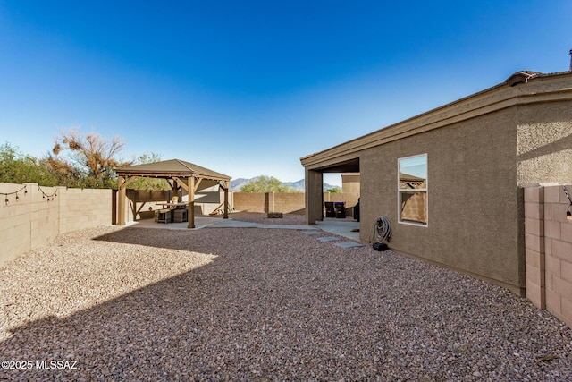 17949 S Whispering Glen Path, Sahuarita, AZ 85629 - fenced backyard with a gazebo and a patio area