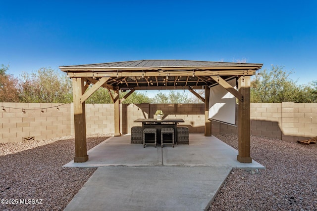 17949 S Whispering Glen Path, Sahuarita, AZ 85629 - view of patio with a gazebo, a fenced backyard, and outdoor dining area