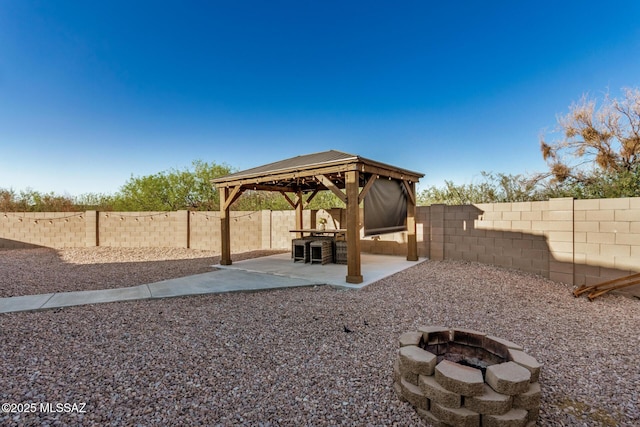 17949 S Whispering Glen Path, Sahuarita, AZ 85629 - fenced backyard featuring a fire pit, a gazebo, and a patio