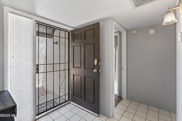 1376 S Desert Meadows Cir, Green Valley, AZ 85614 - foyer featuring light tile patterned floors