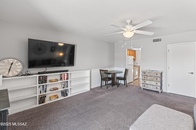 1376 S Desert Meadows Cir, Green Valley, AZ 85614 - carpeted living room with ceiling fan
