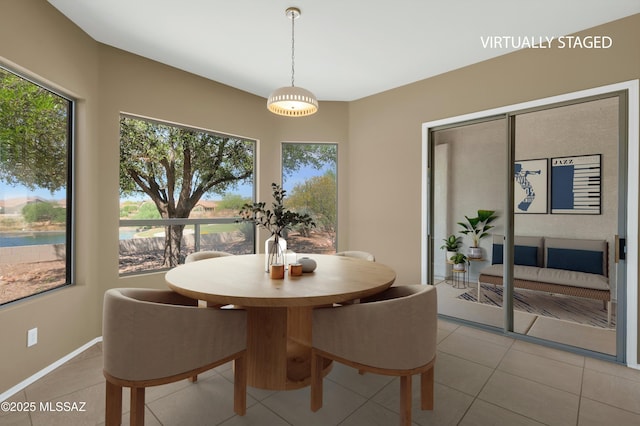 38876 S Serenity Ln, Tucson, AZ 85739 - dining area with light tile patterned floors