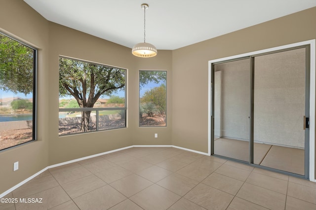 38876 S Serenity Ln, Tucson, AZ 85739 - interior space with baseboards and tile patterned flooring
