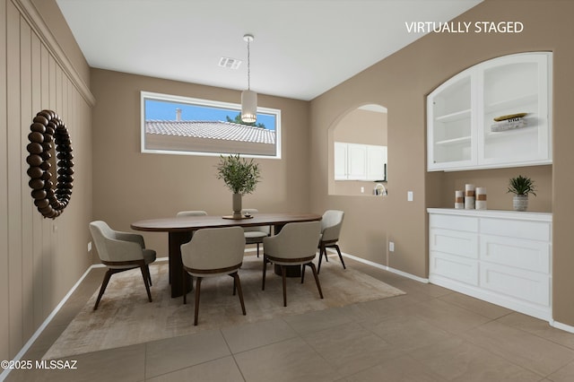 38876 S Serenity Ln, Tucson, AZ 85739 - dining space featuring visible vents and baseboards