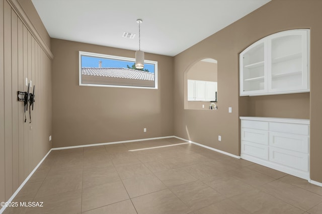 38876 S Serenity Ln, Tucson, AZ 85739 - unfurnished dining area with baseboards and visible vents