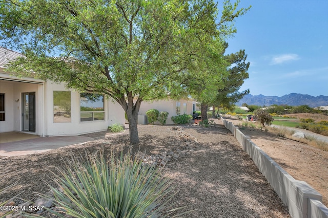 38876 S Serenity Ln, Tucson, AZ 85739 - view of yard featuring fence, a patio area, and a mountain view