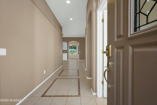 38876 S Serenity Ln, Tucson, AZ 85739 - corridor featuring arched walkways, light tile patterned floors, baseboards, and recessed lighting