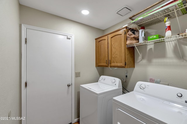 7361 E Riverbank Loop, Tucson, AZ 85715 - clothes washing area with cabinet space and washing machine and clothes dryer