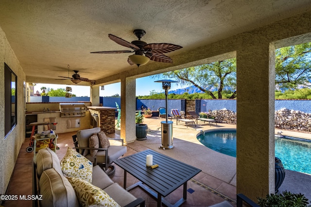 7361 E Riverbank Loop, Tucson, AZ 85715 - view of patio featuring a fenced in pool, a ceiling fan, outdoor lounge area, and a fenced backyard