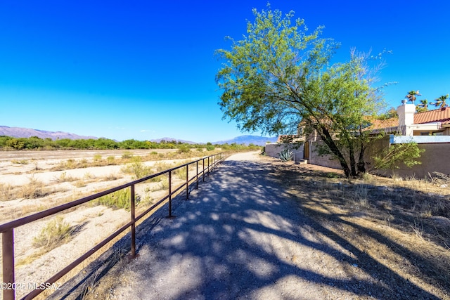 7361 E Riverbank Loop, Tucson, AZ 85715 - view of road featuring a mountain view