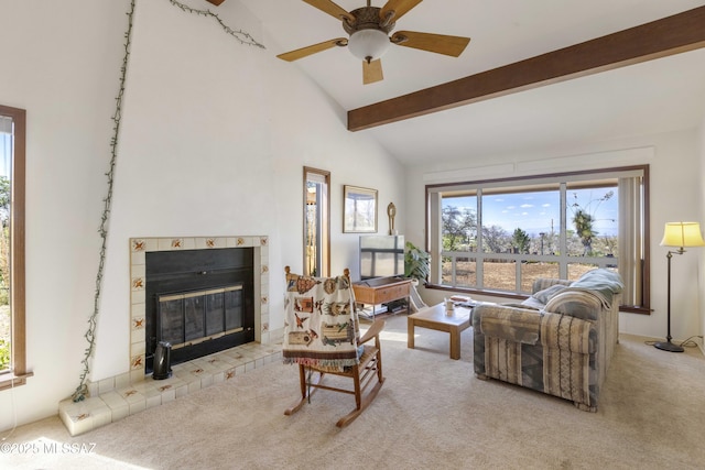 280 W Oak Hills Dr, Oracle, AZ 85623 - carpeted living room featuring a tiled fireplace and a ceiling fan
