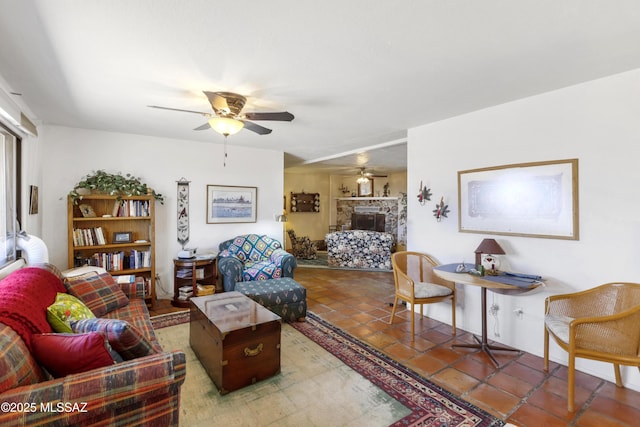 280 W Oak Hills Dr, Oracle, AZ 85623 - living room featuring ceiling fan, tile patterned floors, and a fireplace with raised hearth