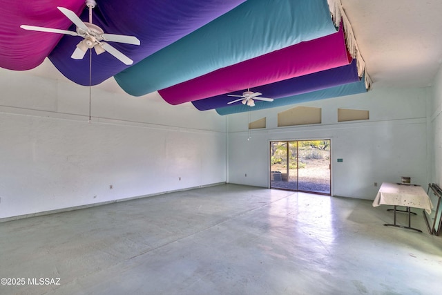 280 W Oak Hills Dr, Oracle, AZ 85623 - empty room featuring concrete flooring, ceiling fan, and high vaulted ceiling