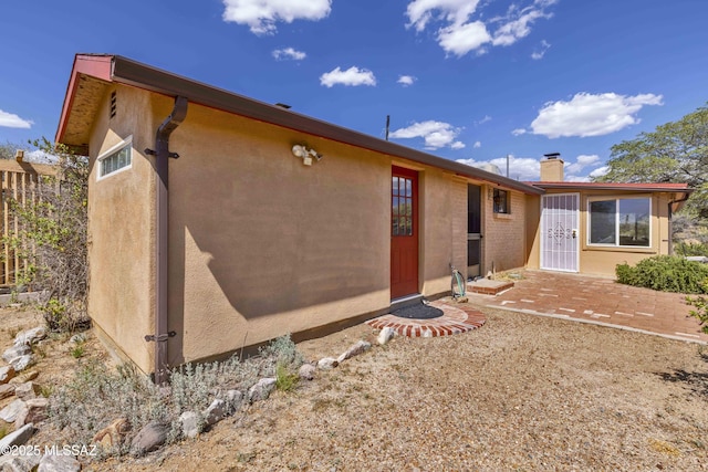 280 W Oak Hills Dr, Oracle, AZ 85623 - rear view of property featuring a chimney and stucco siding