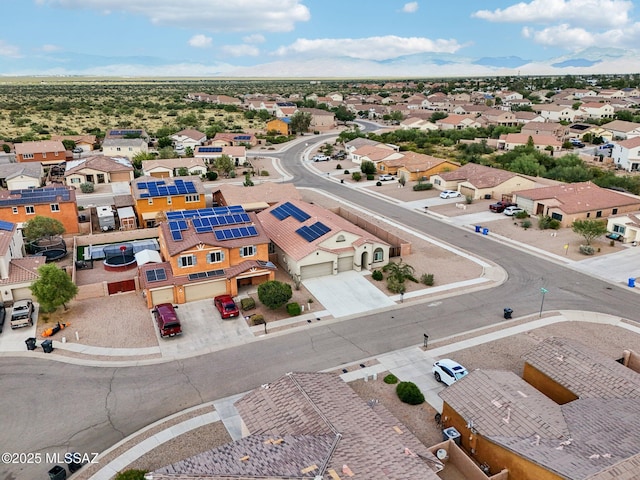 drone / aerial view with a mountain view and a residential view