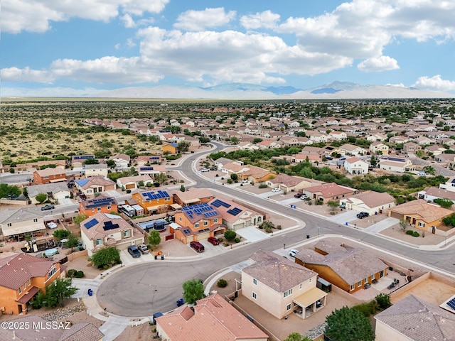 bird's eye view with a residential view and a mountain view