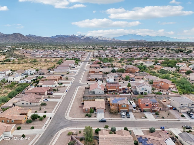 birds eye view of property with a residential view and a mountain view