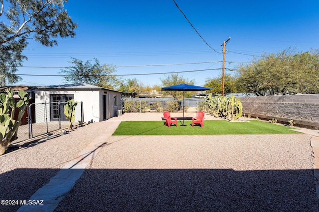 view of yard with a patio and a fenced backyard