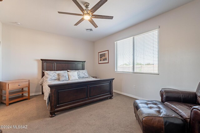 21372 E Charmaine Rd, Red Rock, AZ 85145 - bedroom featuring visible vents, ceiling fan, light carpet, and baseboards