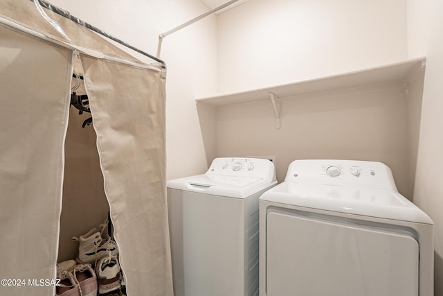 21372 E Charmaine Rd, Red Rock, AZ 85145 - clothes washing area featuring washer and clothes dryer and laundry area