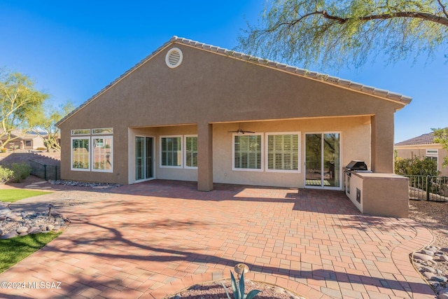 5152 W Heritage Gateway Pl, Marana, AZ 85658 - back of house featuring fence, a patio, and stucco siding