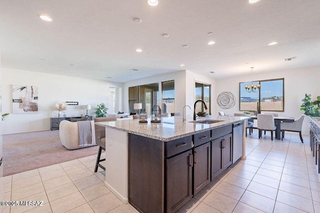 10965 N Cormac Ave, Tucson, AZ 85742 - kitchen featuring dishwasher, a sink, light colored carpet, a chandelier, and recessed lighting