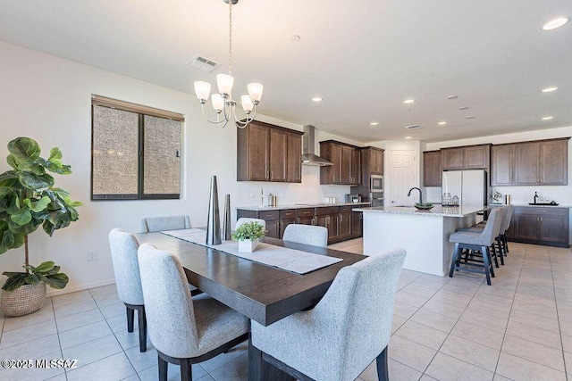 10965 N Cormac Ave, Tucson, AZ 85742 - dining room with light tile patterned floors, a chandelier, recessed lighting, and baseboards