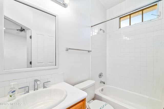 3748 N Sabino Ridge Pl, Tucson, AZ 85750 - full bathroom with toilet, vanity, shower / bath combination, and decorative backsplash