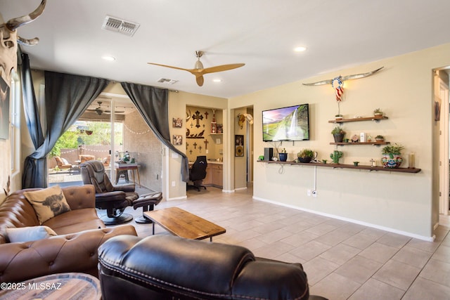 6515 E Vuelta Tierra Blanca, Tucson, AZ 85756 - living room featuring ceiling fan, recessed lighting, light tile patterned floors, and baseboards
