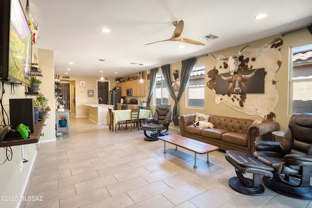 6515 E Vuelta Tierra Blanca, Tucson, AZ 85756 - living area with ceiling fan, recessed lighting, and light tile patterned floors