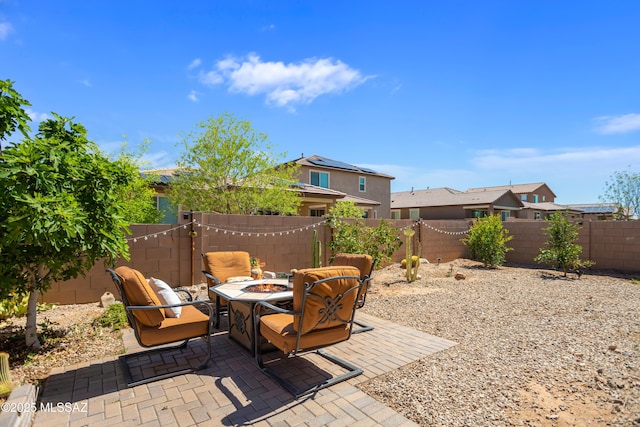 6515 E Vuelta Tierra Blanca, Tucson, AZ 85756 - fenced backyard featuring a fire pit and a patio