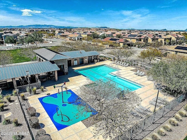 6515 E Vuelta Tierra Blanca, Tucson, AZ 85756 - community pool featuring a residential view, a patio, and a mountain view