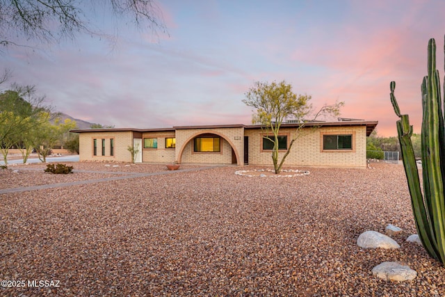 1363 W Dawn Dr, Tucson, AZ 85704 - mid-century inspired home featuring brick siding