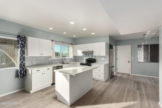 1363 W Dawn Dr, Tucson, AZ 85704 - kitchen with stainless steel appliances, a sink, backsplash, white cabinets, and recessed lighting