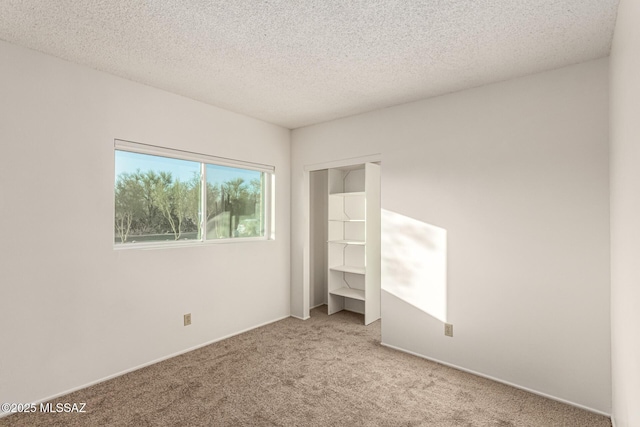 1363 W Dawn Dr, Tucson, AZ 85704 - unfurnished bedroom with carpet floors and a textured ceiling