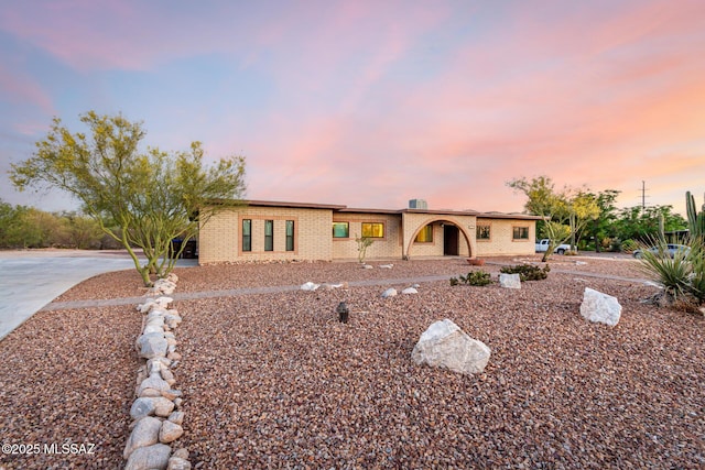 1363 W Dawn Dr, Tucson, AZ 85704 - view of front of house featuring brick siding