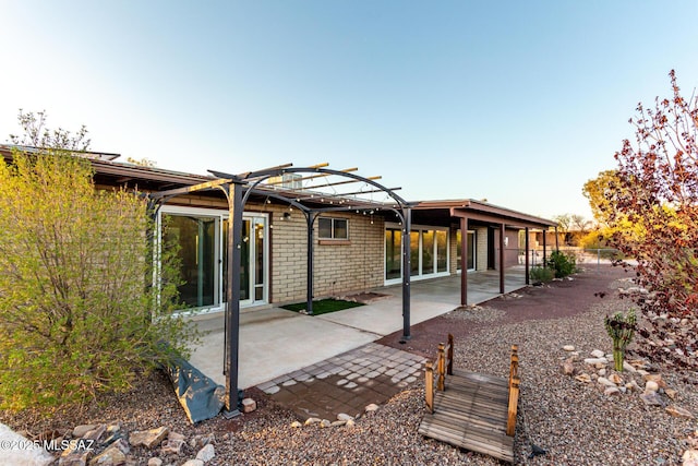 1363 W Dawn Dr, Tucson, AZ 85704 - back of property featuring a pergola and a patio