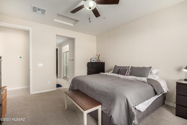 bedroom featuring attic access, light carpet, visible vents, and baseboards
